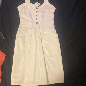 Never worn, cute white dress, pockets, kids